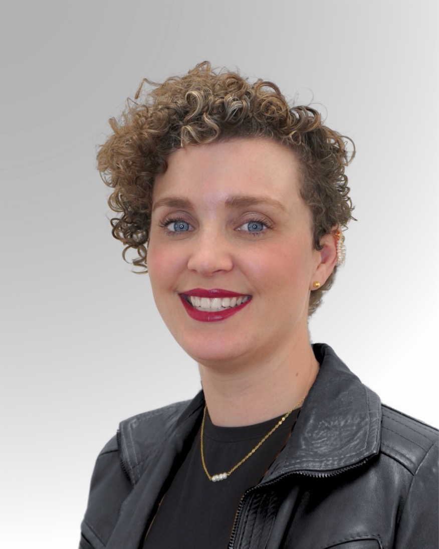Tracy Bingaman, PA-C head shot of PA tracy wearing black jacket
